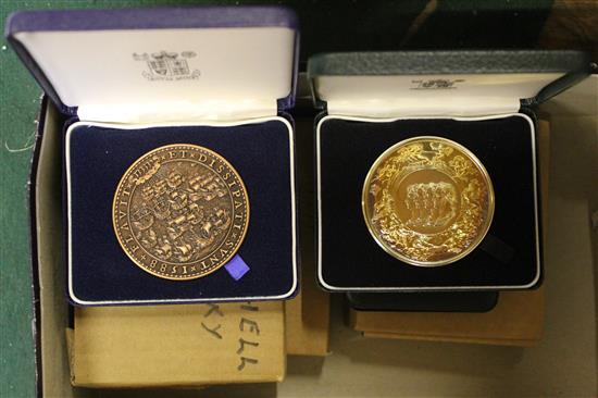 6 silver commemorative medallions and a bronze example